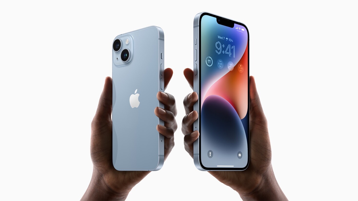 Two hands hold up iPhone 14 and iPhone 14 Plus.