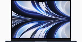 MacBook Air in midnight displaying a wallpaper.