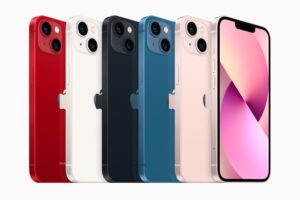 iPhone 13 lineup in (PRODUCT)RED, starlight, midnight, blue, and pink.